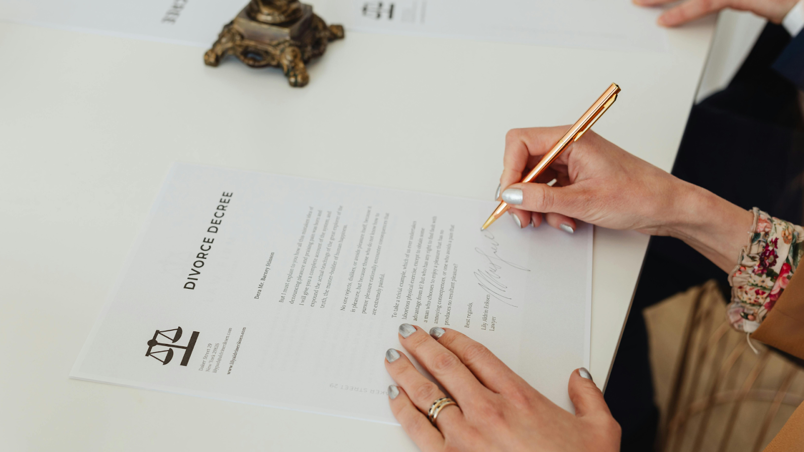 Person Signing Divorce Papers