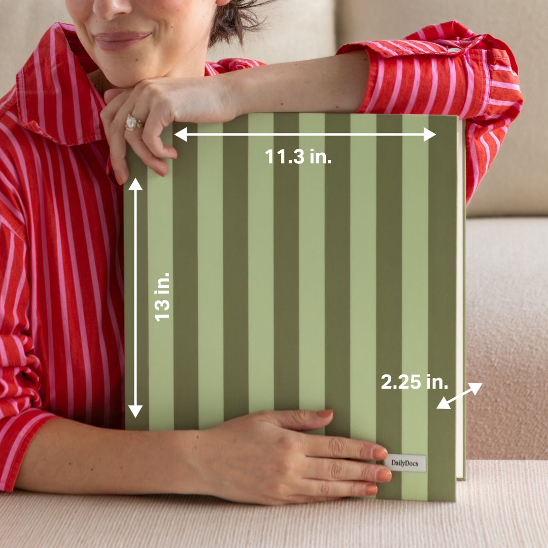 Person holding a green striped DailyDocs organizer with measurements and a brand label.