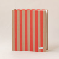 Document organizer with red and beige vertical stripes on a beige background