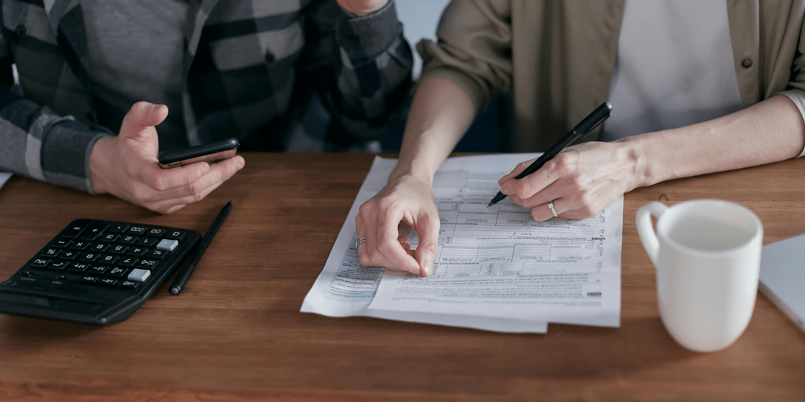 A Married Couple Figuring Out Their Tax Forms Together