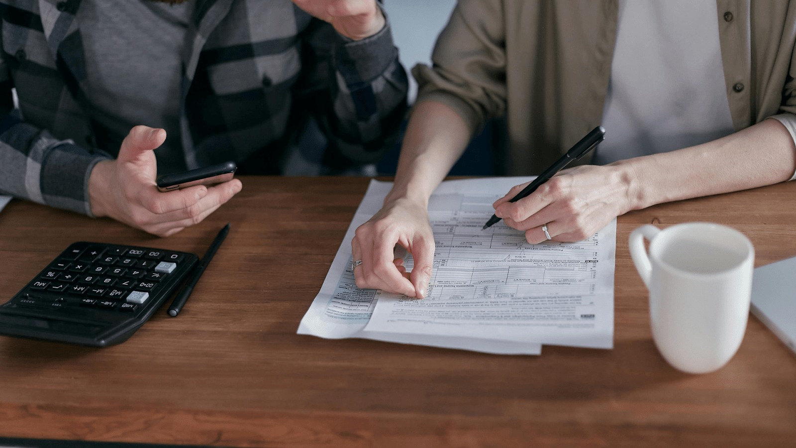 A Married Couple Figuring Out Their Tax Forms Together