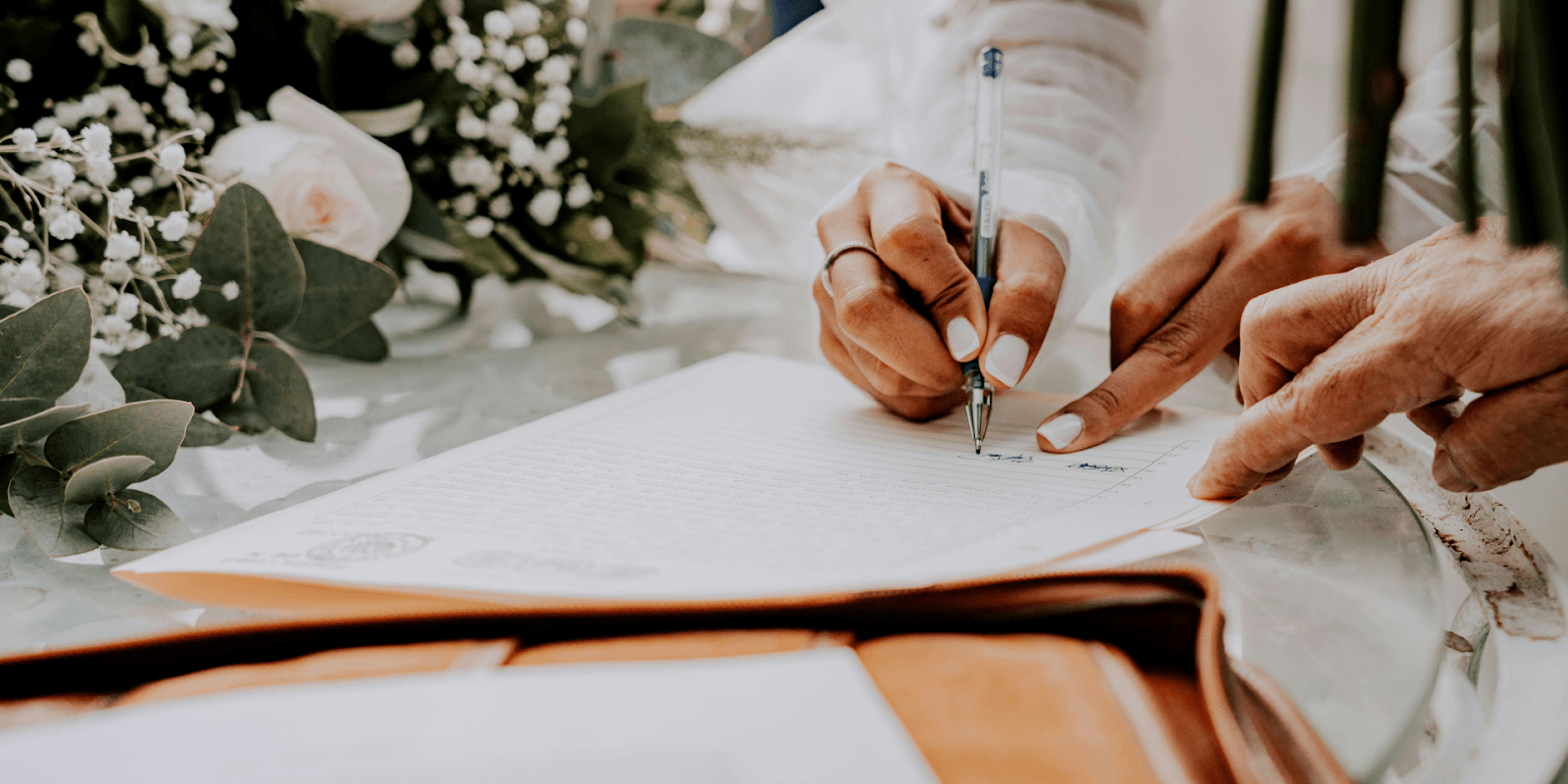Bride Signing Her Marriage Certificate
