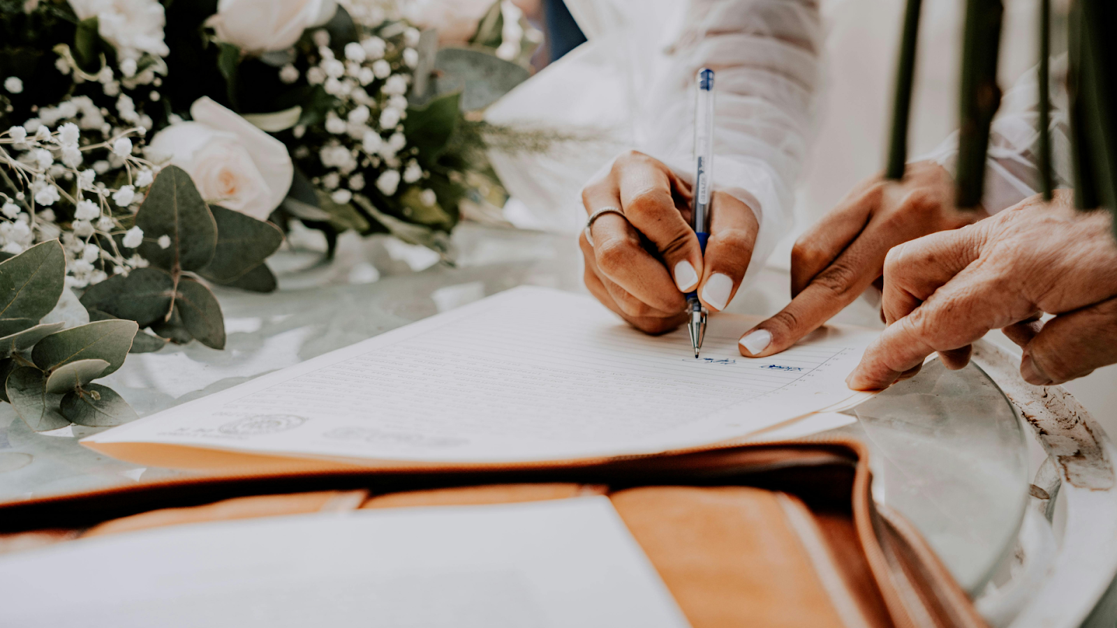 Bride Signing Her Marriage Certificate