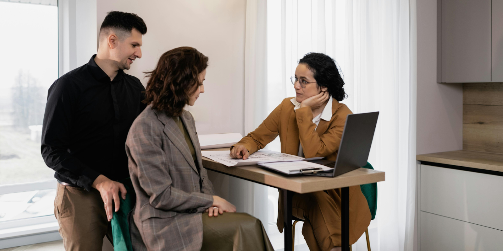 Couple Preparing Estate Planning Documents With A Lawyer