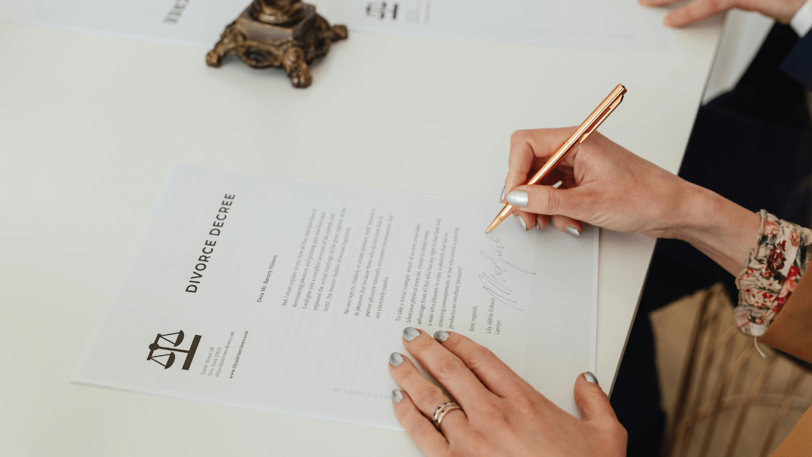 Person Signing Divorce Papers