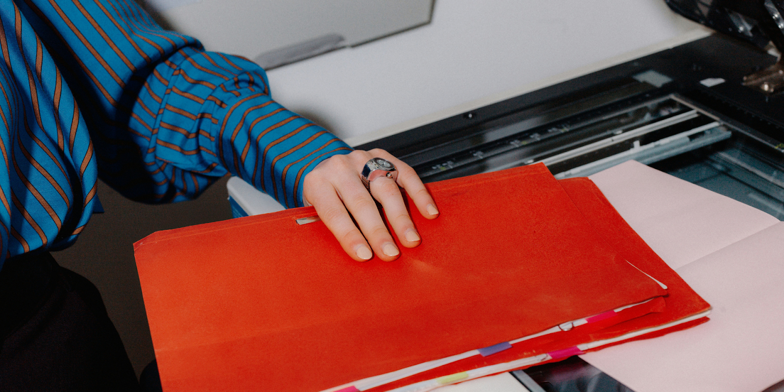 Woman Setting Up A DailyDocs Binder
