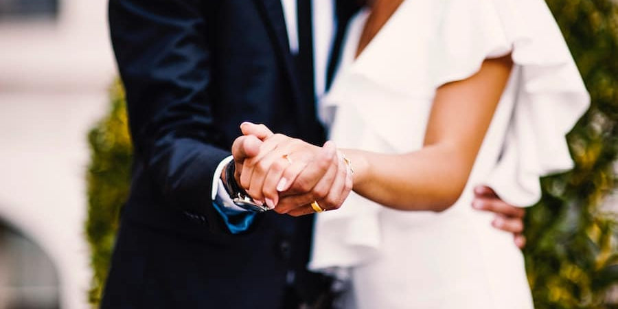 A couple holding hands