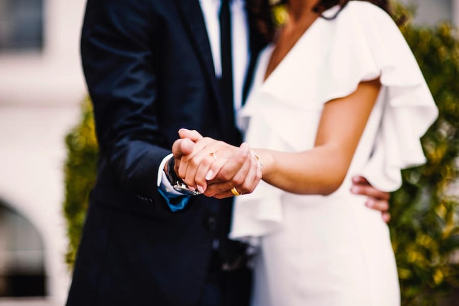 A couple holding hands