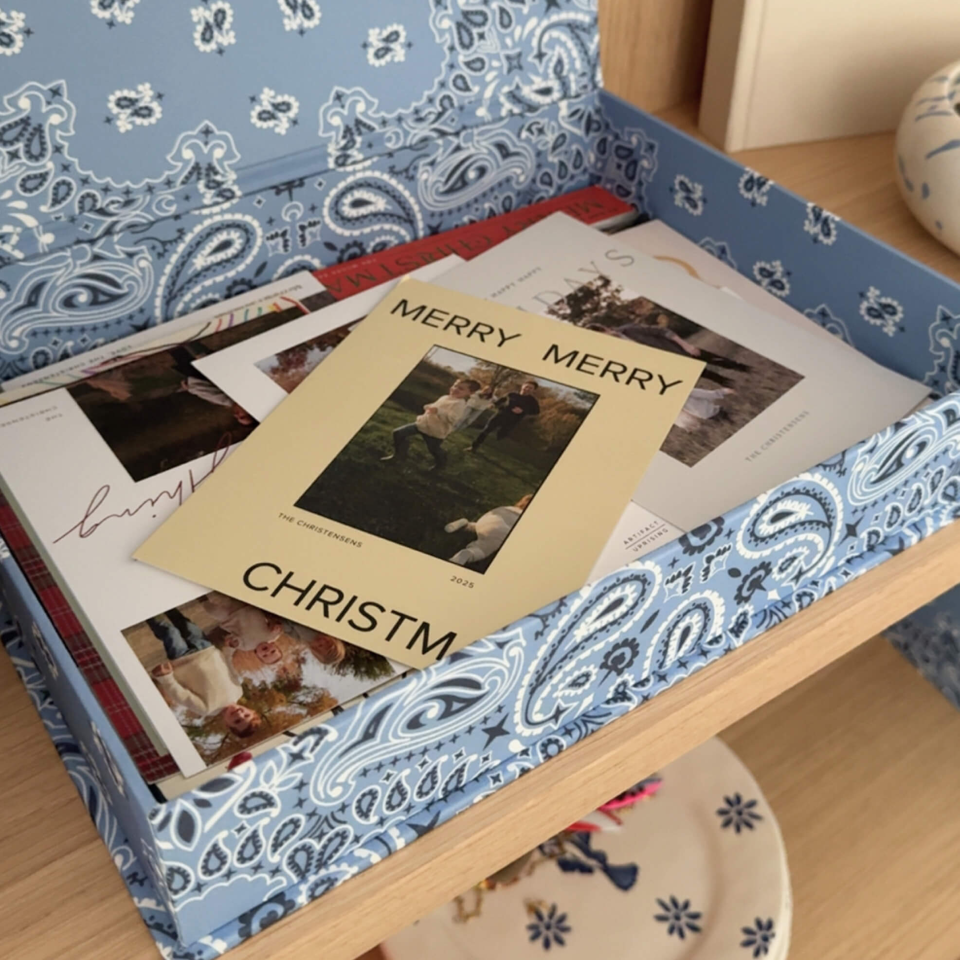 A Bandana Blue DailyDocs Keepsake Box filled with Christmas cards