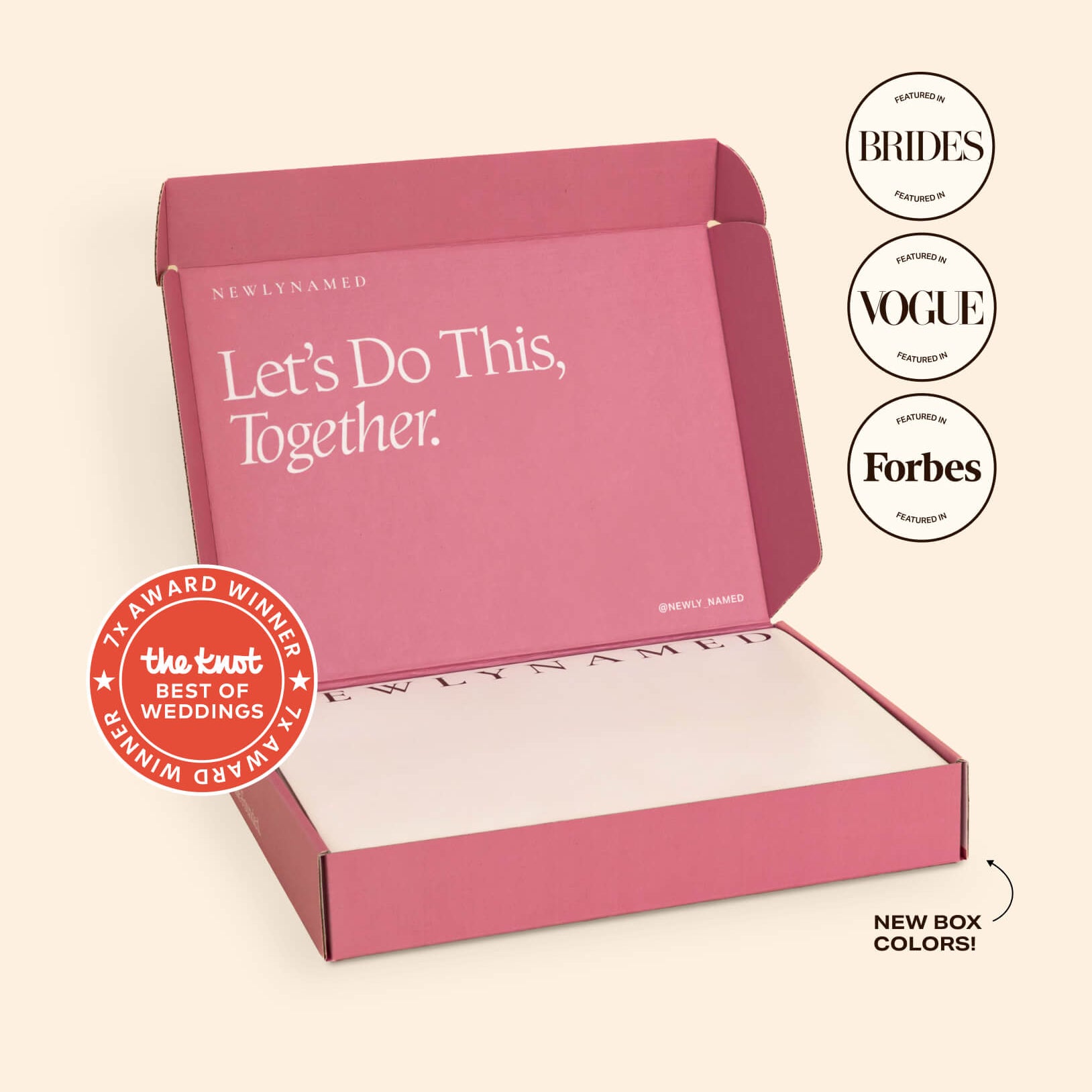 An open signature pink NewlyNamed Box personalized name change kit for post-marriage document updates.