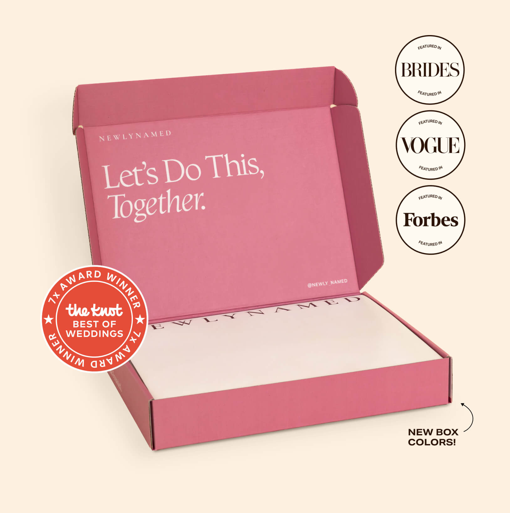 An open signature pink NewlyNamed Box personalized name change kit for post-marriage document updates.