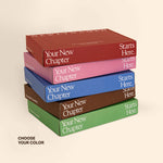 A dynamic stacked view of NewlyNamed Box options highlighting premium color choices for a personalized marriage name change kit.