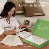 An open green NewlyNamed Box showcasing everything included: a personalized checklist, pre-filled applications, pre-paid postage envelopes, and real human support.